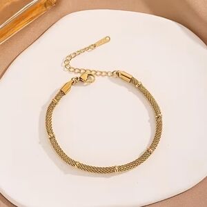 18 KT Gold Over Titanium Bracelet